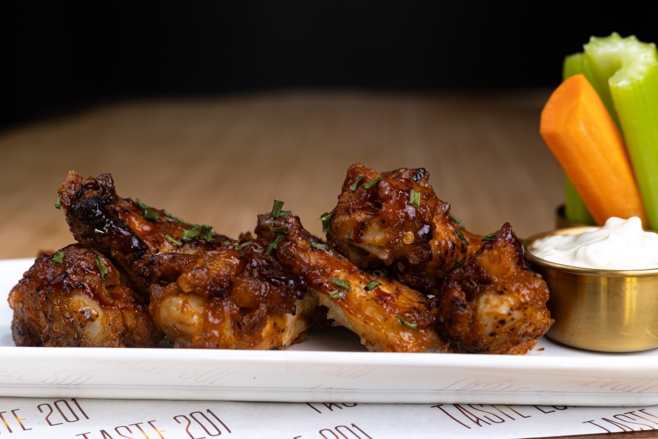 Chicken wings with dips and crudités